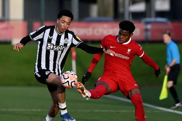 Keyrol Figueroa of Liverpool and Travis Hernes of Newcastle United. (Photo by Nick Taylor/Liverpool FC/Liverpool FC via Getty Images)