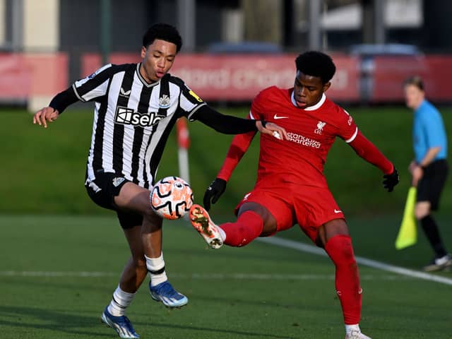Keyrol Figueroa of Liverpool and Travis Hernes of Newcastle United. (Photo by Nick Taylor/Liverpool FC/Liverpool FC via Getty Images)