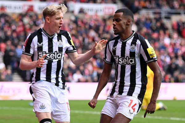 Alexander Isak of Newcastle United celebrates with Anthony Gordon after scoring his team's second goal during the Emirates FA Cup Third Round match between Sunderland and Newcastle United at Stadium of Light on January 06, 2024 in Sunderland, England. (Photo by Stu Forster/Getty Images)
