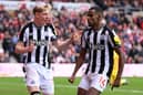 Alexander Isak of Newcastle United celebrates with Anthony Gordon after scoring his team's second goal during the Emirates FA Cup Third Round match between Sunderland and Newcastle United at Stadium of Light on January 06, 2024 in Sunderland, England. (Photo by Stu Forster/Getty Images)