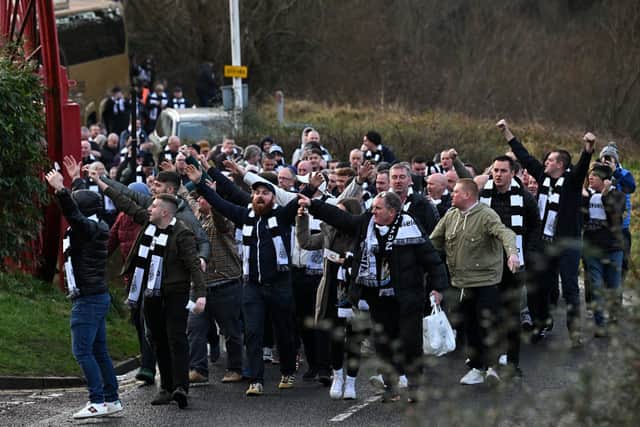 Newcastle United supporters arrivng by coach at the Stadium of Light in 2024. 