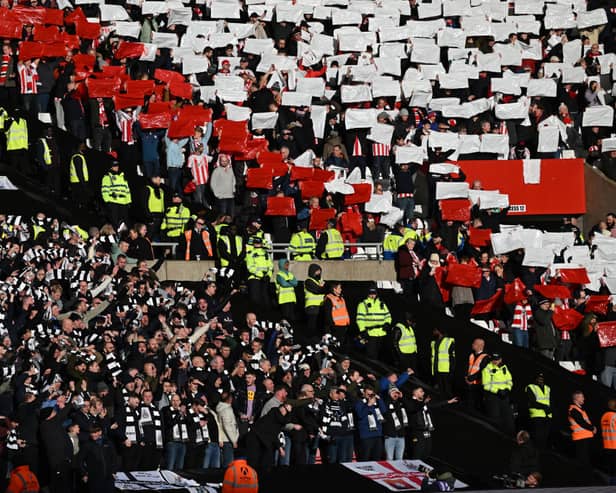 Sunderland and Newcastle United fans at the Stadium of Light are separated by a police cordon.