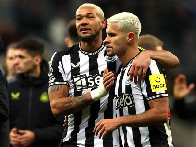 Joelinton of Newcastle United celebrates with teammate Bruno Guimaraes following the team's victory during the Premier League match between Newcastle United and Chelsea FC at St. James Park on November 25, 2023 in Newcastle upon Tyne, England. (Photo by Ian MacNicol/Getty Images)