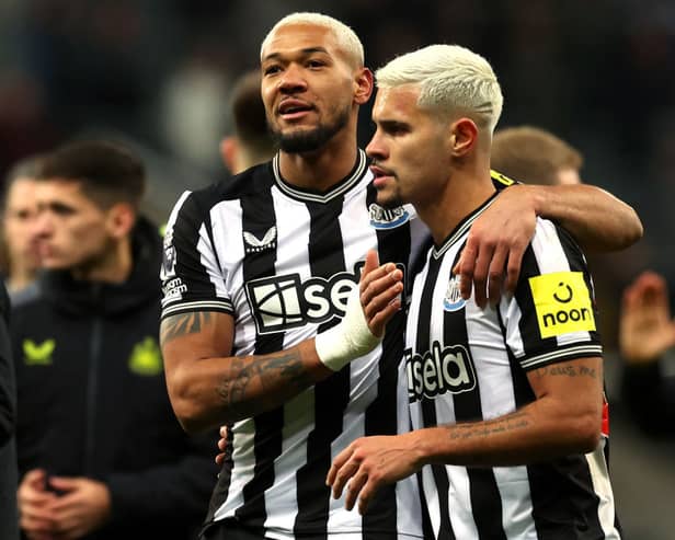 Joelinton of Newcastle United celebrates with teammate Bruno Guimaraes following the team's victory during the Premier League match between Newcastle United and Chelsea FC at St. James Park on November 25, 2023 in Newcastle upon Tyne, England. (Photo by Ian MacNicol/Getty Images)