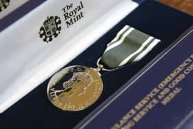 Ambulance workers receive Queen’s Medal for their contribution to emergency services