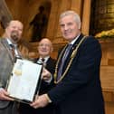 Cllr Paul Dean (left) presenting the award to the Mayor, Cllr John McCabe, with Joe Mills from NAAFI Break (middle). Photo: South Tyneside Council.