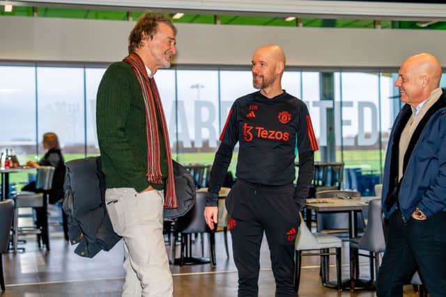 Sir Jim Ratcliffe and Sir Dave Brailsford of INEOS meet Manager Erik ten Hag of Manchester United in the staff restaurant at Carrington Training Complex on January 03, 2024 in Manchester, England. (Photo by Manchester United/Manchester United via Getty Images)
