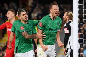 Dan Burn of Newcastle United celebrates scoring his team's second goal during the Emirates FA Cup Fourth Round match between Fulham and Newcastle United at Craven Cottage on January 27, 2024 in London, England. (Photo by Mike Hewitt/Getty Images)