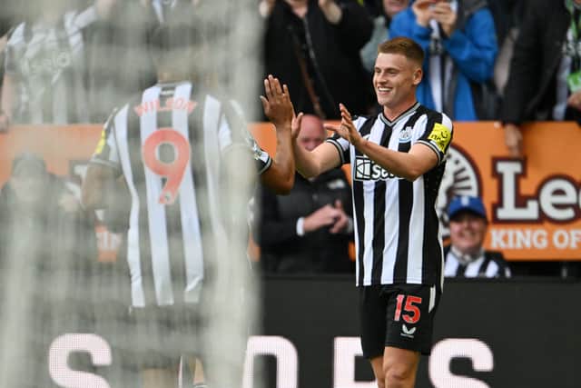 Harvey Barnes celebrates scoring against Aston Villa on his Premier League debut for Newcastle.