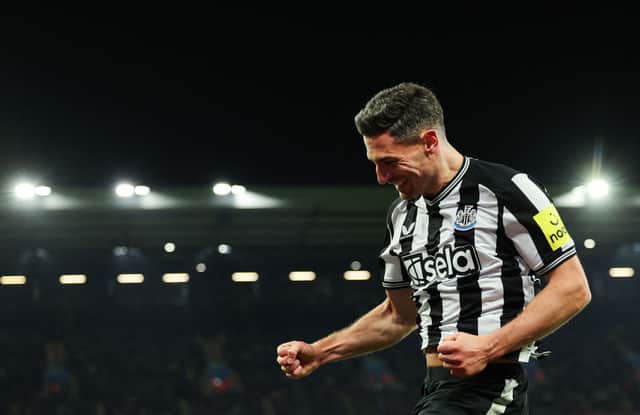 Newcastle United's Swiss defender #05 Fabian Schar celebrates after scoring his team second goal during the English Premier League football match between Aston Villa and Newcastle United at Villa Park in Birmingham, central England on January 30, 2024. (Photo by Adrian DENNIS / AFP) 