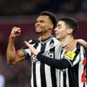 Miguel Almiron and Jacob Murphy celebrate Newcastle United's third goal against Aston Villa. 