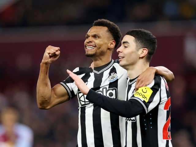 Miguel Almiron and Jacob Murphy celebrate Newcastle United's third goal against Aston Villa. 