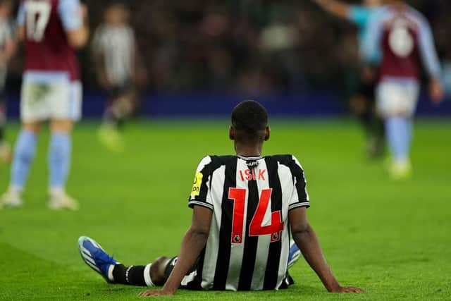 Newcastle United's Swedish striker #14 Alexander Isak reacts during the English Premier League football match between Aston Villa and Newcastle United at Villa Park in Birmingham, central England on January 30, 2024. (Photo by Adrian DENNIS / AFP) 