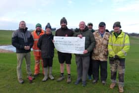 Whitburn Golf Club officials and volunteers with course architect Jonathan Gaunt and course constructor Charlie Greasley.