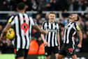 Bruno Guimaraes of Newcastle United celebrates after teammate Harvey Barnes scores the team's fourth goal during the Premier League match between Newcastle United and Luton Town at St. James Park on February 03, 2024 in Newcastle upon Tyne, England. (Photo by Matt McNulty/Getty Images)