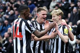 Anthony Gordon celebrates scoring for Newcastle United.