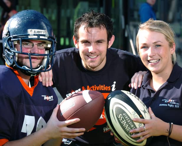 Sunderland University freshers had the choice of sports in 2011 -  from A for American Football to W and women's rugby. 
Pictured are David Peddie, centre, from the Institute of Sports with Tom Mugford and Emma Roberts. 