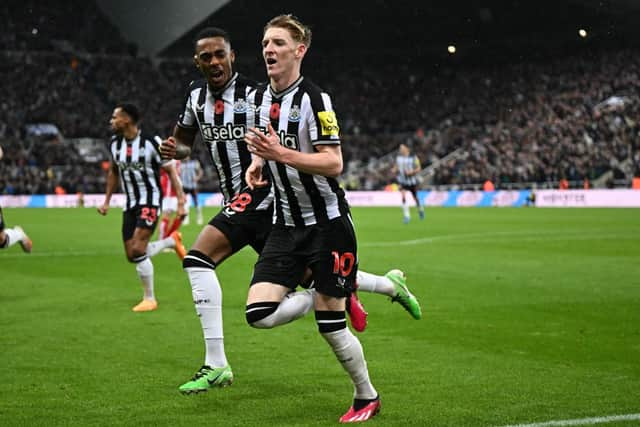 Anthony Gordon celebrates scoring against Arsenal