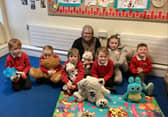 Lynn Nixon with pupils from the school
