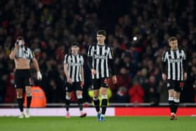Lewis Miley of Newcastle United looks dejected after Bukayo Saka of Arsenal (not pictured) scores his team's third goal during the Premier League match between Arsenal FC and Newcastle United at Emirates Stadium on February 24, 2024 in London, England. (Photo by Justin Setterfield/Getty Images)