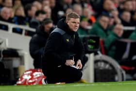 Eddie Howe, Manager of Newcastle United, takes notes during the Premier League match between Arsenal FC and Newcastle United at Emirates Stadium on February 24, 2024 in London, England. (Photo by Justin Setterfield/Getty Images)