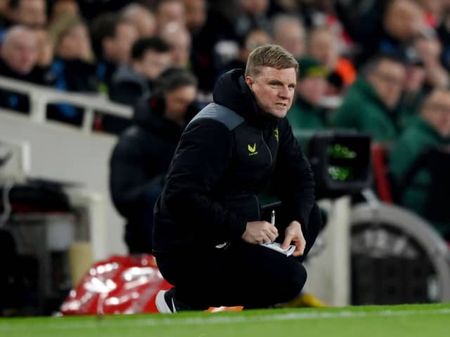 Eddie Howe, Manager of Newcastle United, takes notes during the Premier League match between Arsenal FC and Newcastle United at Emirates Stadium on February 24, 2024 in London, England. (Photo by Justin Setterfield/Getty Images)
