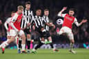 Joe Willock of Newcastle United battles for possession with Emile Smith Rowe and Jorginho of Arsenal during the Premier League match between Arsenal FC and Newcastle United at Emirates Stadium on February 24, 2024 in London, England. (Photo by Julian Finney/Getty Images)