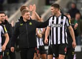 Newcastle United boss Eddie Howe and defender Sven Botman. (Photo by Stu Forster/Getty Images)