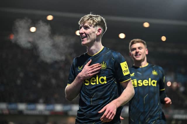 Newcastle United's English midfielder #10 Anthony Gordon celebrates after scoring his team first goal during the English FA Cup fifth round football match between Blackburn Rovers and Newcastle United at Ewood Park in Blackburn, north west England on February 27, 2024. (Photo by Paul ELLIS / AFP) 