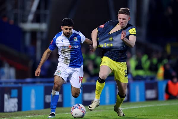 Dilan Markanday of Blackburn Rovers and Elliot Anderson of Newcastle United battle for possession during the Emirates FA Cup Fifth Round match between Blackburn Rovers and Newcastle United at Ewood Park on February 27, 2024 in Blackburn, England. (Photo by Alex Livesey/Getty Images)
