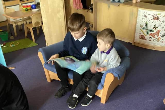 Children taking part in the reading