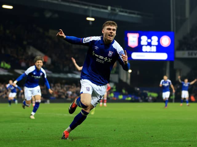 Leif Davis of Ipswich Town celebrates scoring his team's third goal during the Sky Bet Championship match between Ipswich Town and Bristol City at Portman Road on March 05, 2024 in Ipswich, England.