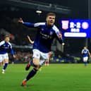 Leif Davis of Ipswich Town celebrates scoring his team's third goal during the Sky Bet Championship match between Ipswich Town and Bristol City at Portman Road on March 05, 2024 in Ipswich, England.