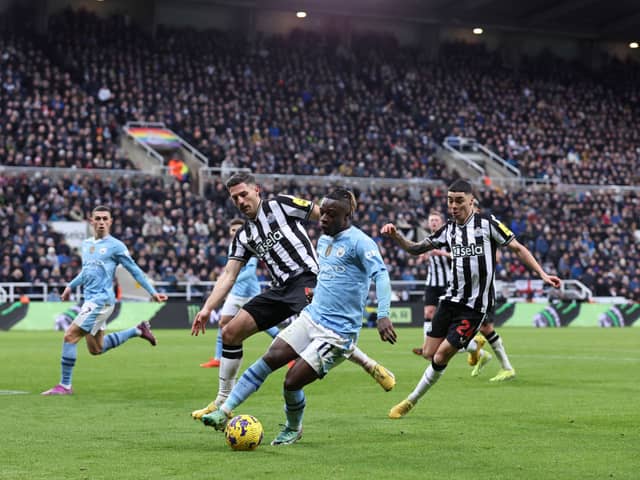 Jeremy Doku in action against Newcastle United. The Belgian is a doubt for City's Champions League clash against FC Copenhagen ahead of games against Liverpool and their FA Cup Quarter Final versus Newcastle United.