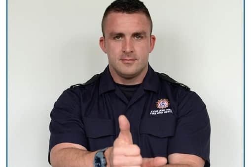Firefighter doing sign language