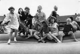 Youngsters from Hexham Avenue on the inflatables organised by South Tyneside Council in August 1985.