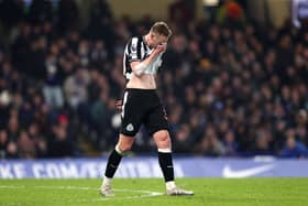Sean Longstaff of Newcastle United reacts during the Premier League match between Chelsea FC and Newcastle United at Stamford Bridge on March 11, 2024 in London, England. (Photo by Alex Pantling/Getty Images)