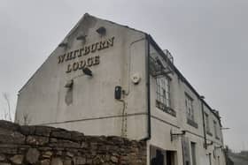 Plans to demolish the Whitburn Lodge have been delayed again.