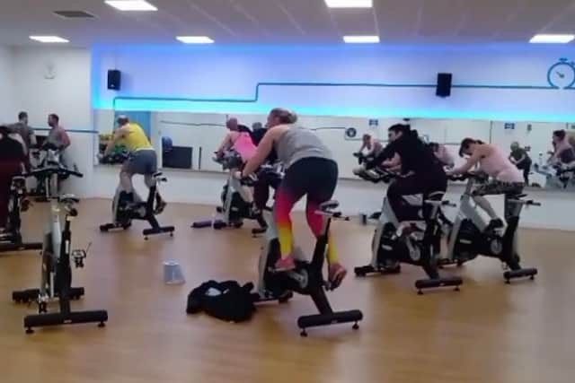 Members taking part in spinning class