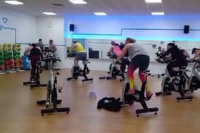 Members taking part in spinning class