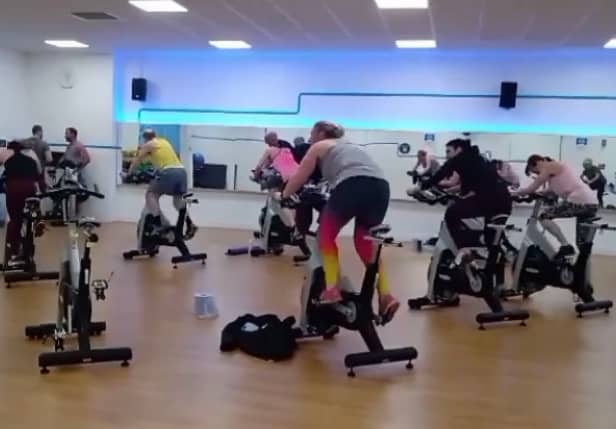 Members taking part in spinning class