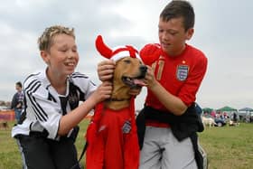 A scene from the Great North Dog Walk in World Cup year? Can you recognise the people in the picture with football-loving Frodo the dog? 