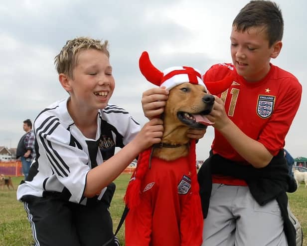 A scene from the Great North Dog Walk in World Cup year? Can you recognise the people in the picture with football-loving Frodo the dog? 