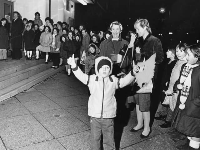 Queuing outside the Savoy for the panto in January 1984. Can you spot someone you know?