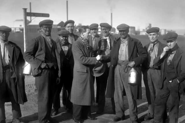Harry Nattrass is congratulated by his colleagues after receiving the news that was to referee the FA Cup Final in 1936.