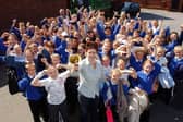 Year 6 students at Mowbray Junior School are pictured with head teacher Denise Todd in 2004. Can you spot anyone you know? 