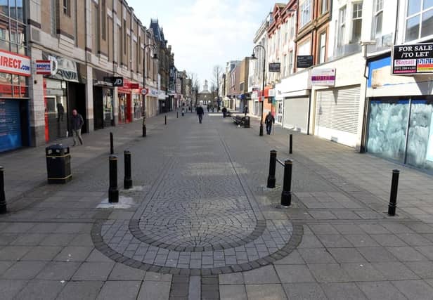 King Street, pictured on March 25, just after Government lockdown rules were announced, allowing people to only leave the house to buy essentials and exercise once a day.