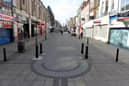 King Street, pictured on March 25, just after Government lockdown rules were announced, allowing people to only leave the house to buy essentials and exercise once a day.