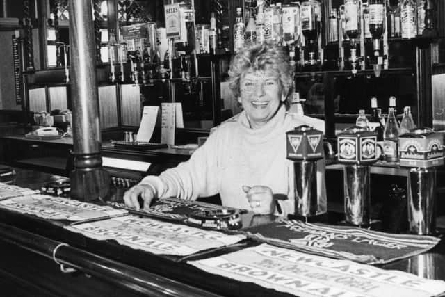 Margaret Macartney of the Pier Hotel, Ocean Road. Here she is behind the bar in 1988.