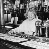 Margaret Macartney of the Pier Hotel, Ocean Road. Here she is behind the bar in 1988.
